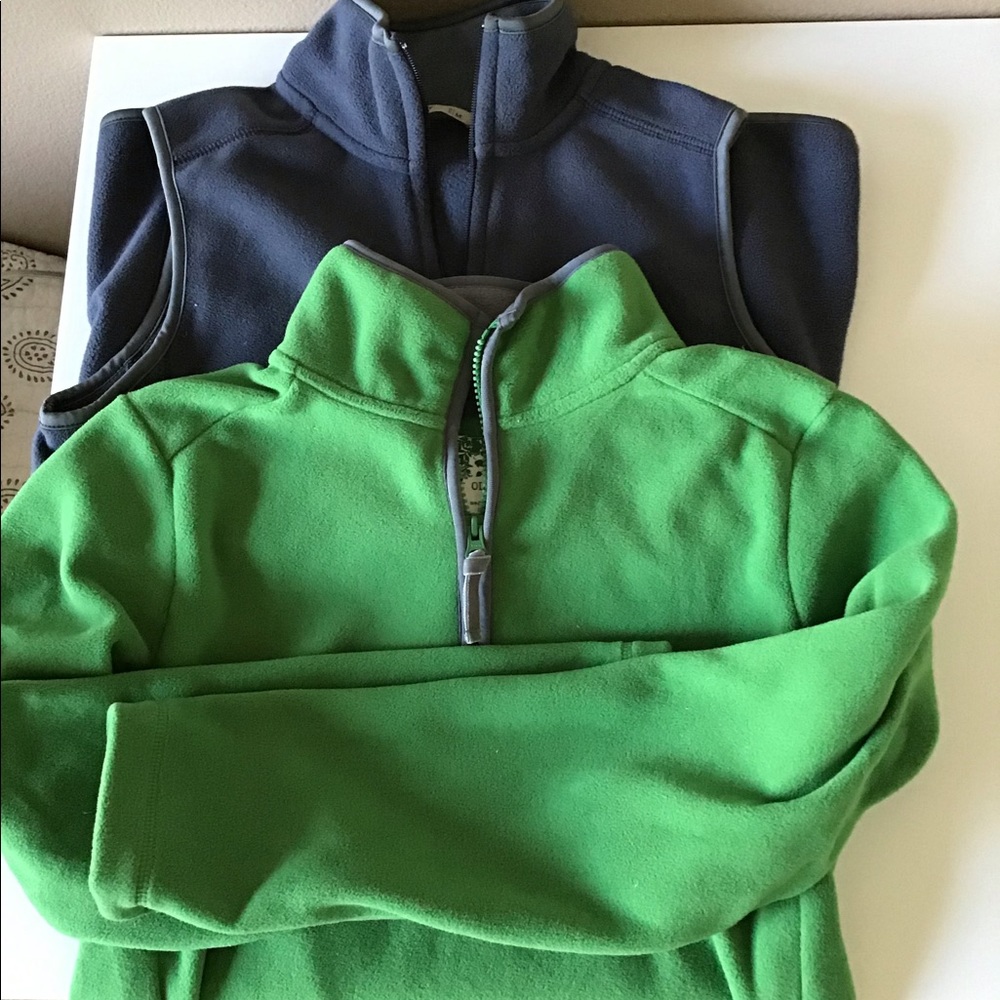 Two Fleeces. One vest and one 1/4 zip fleece.